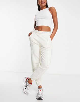 The Couture Club lounge spliced applique joggers in off white co-ord