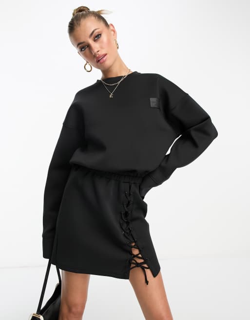 The Couture Club mini jumper dress with lace up detail in black ASOS