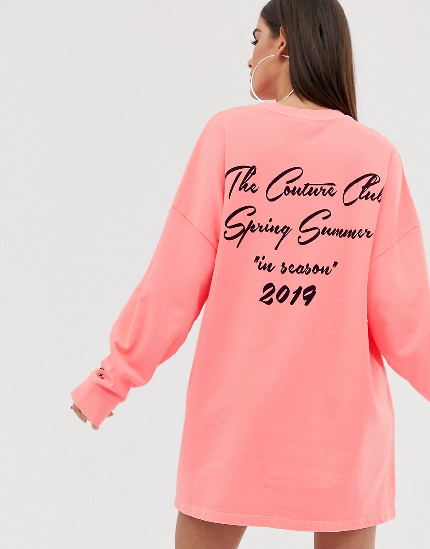 The Couture Club - Neonpink syrevasket oversized t-shirt-kjole med lange ærmer og motiv