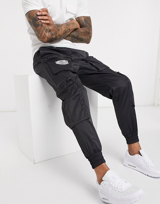 The Couture Club nylon cargo trousers with 3D pockets in black