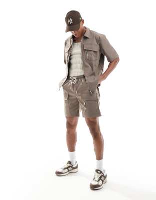 The Couture Club nylon zip through utility shorts in brown (part of a set)