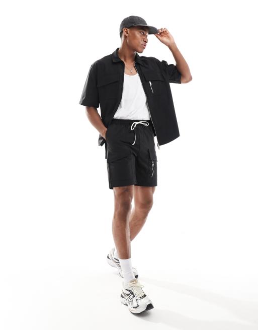 The Couture Club nylon zip up utility shorts in black - part of a set