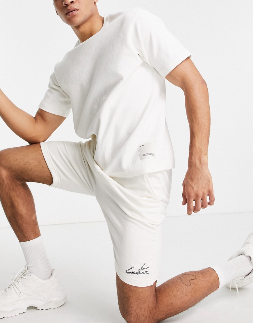 The Couture Club outline regular fit jogger shorts in off white