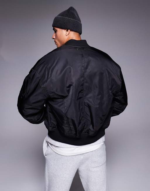 The Couture Club – Oversize-Bomberjacke in Schwarz mit Emblem, 2 von 4