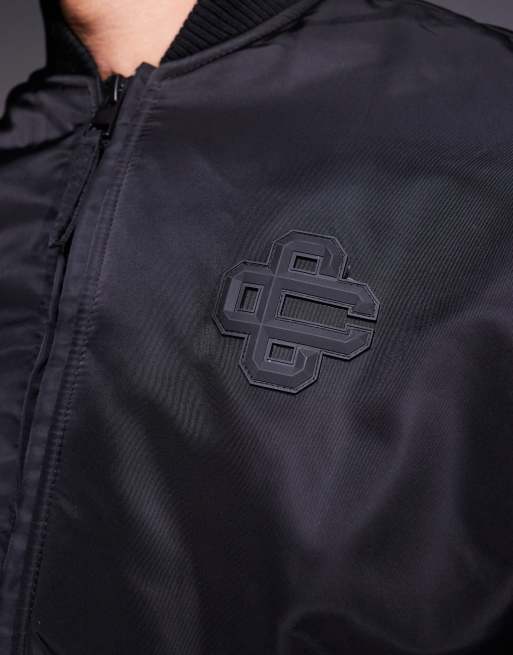 The Couture Club – Oversize-Bomberjacke in Schwarz mit Emblem, 3 von 4