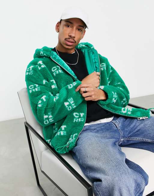 The Couture Club oversized hooded faux fur jacket in green with CTRE all over print