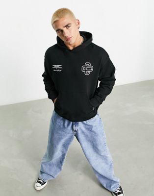 The Couture Club oversized hoodie in black with emblemscript logo print