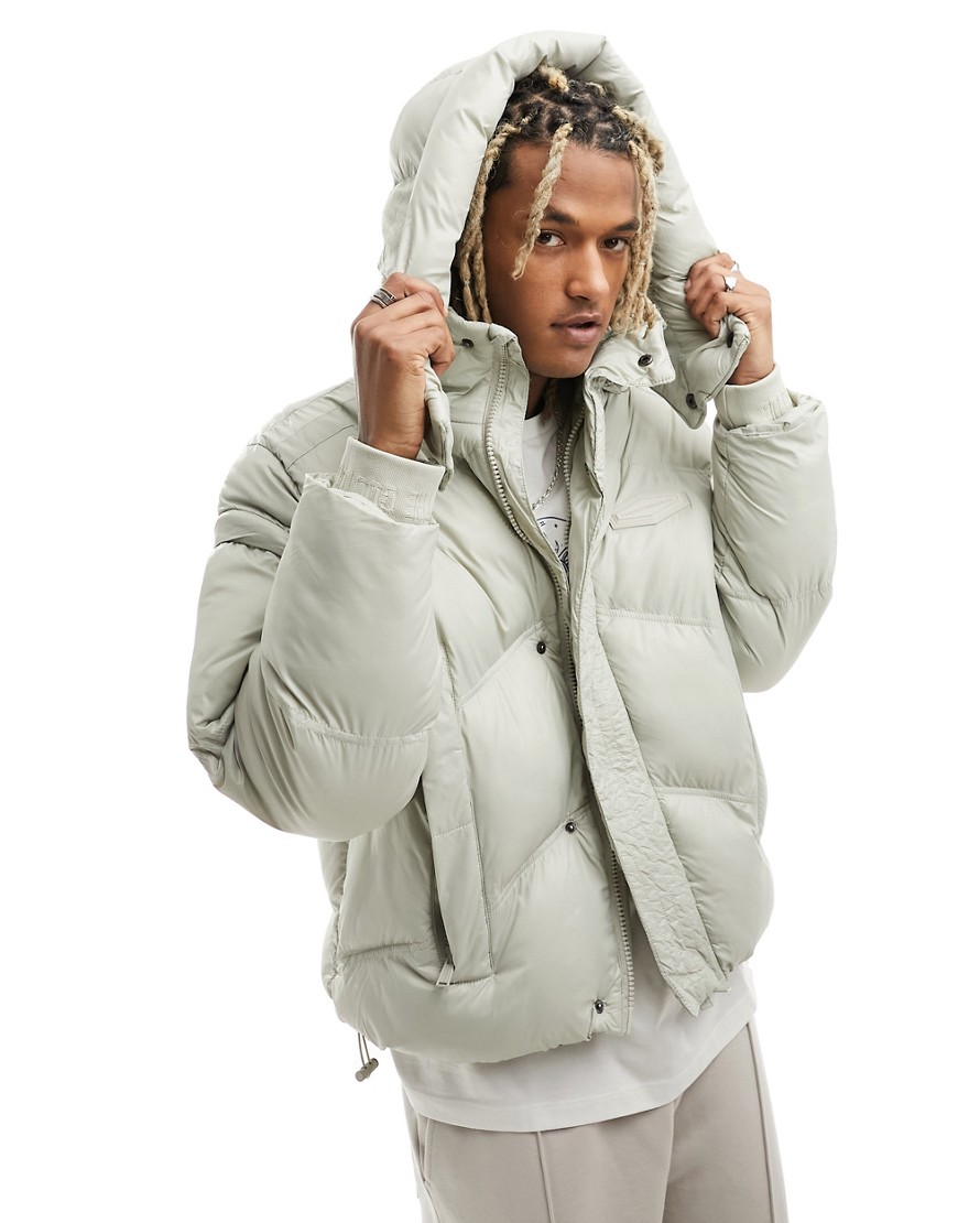 oversized puffer jacket in beige with zipper sleeve detail-Neutral