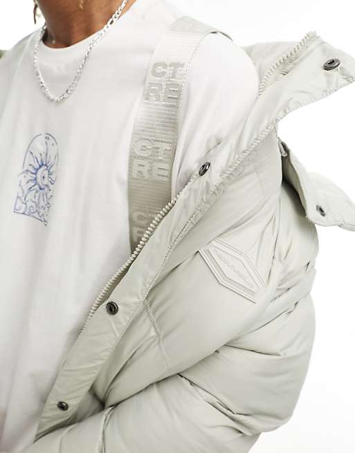The Couture Club oversized puffer jacket in beige with The Couture Club oversized puffer jacket in beige with