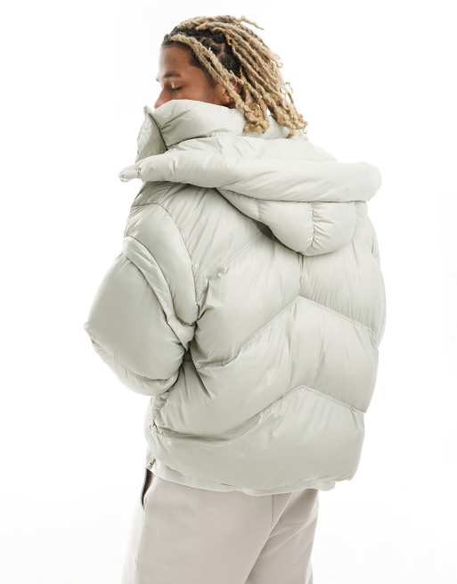 The Couture Club oversized puffer jacket in beige with zipper sleeve detail