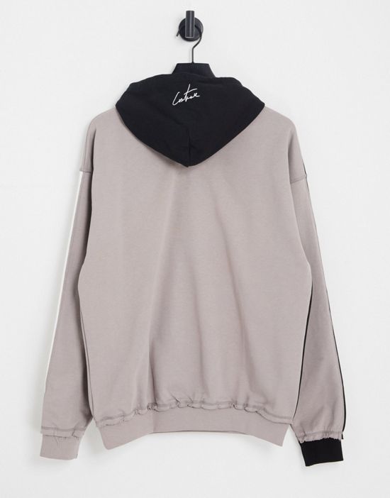 https://images.asos-media.com/products/the-couture-club-oversized-pullover-hoodie-in-gray-and-black-splicing-part-of-a-set/202260524-3?$n_550w$&wid=550&fit=constrain