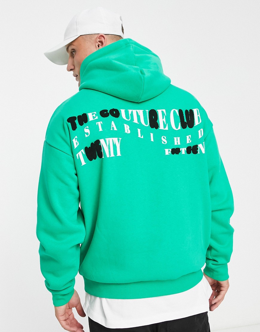 oversized pullover hoodie in green with boucle detail back print