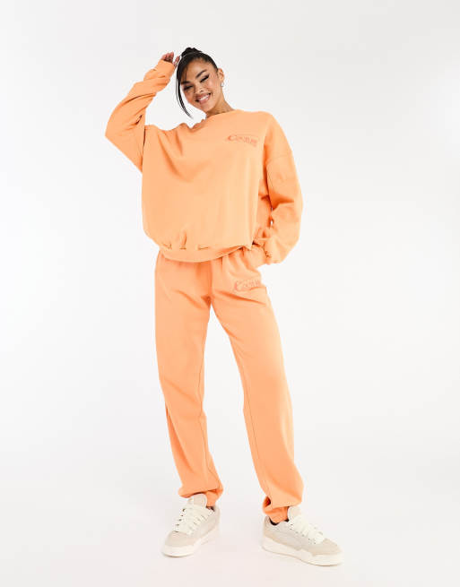 The Couture Club oversized trackies in orange (part of a set)