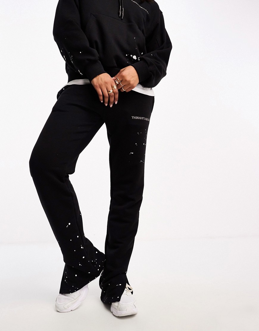 The Couture Club paint splatter straight leg jogger in black