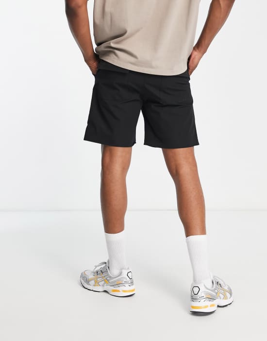 https://images.asos-media.com/products/the-couture-club-paneled-cargo-shorts-in-black/202799065-2?$n_550w$&wid=550&fit=constrain