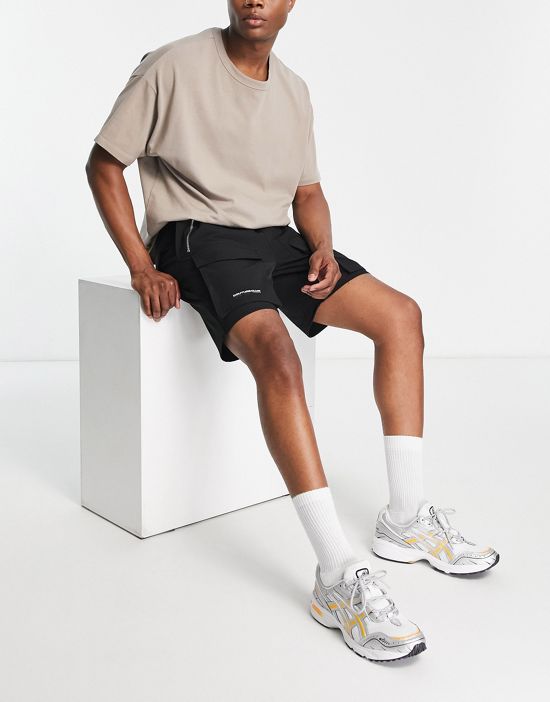 https://images.asos-media.com/products/the-couture-club-paneled-cargo-shorts-in-black/202799065-4?$n_550w$&wid=550&fit=constrain