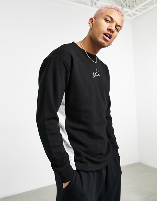 The Couture Club pannelled hemless crew sweatshirt in black