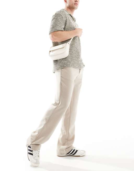 The Couture Club pants with split hem in beige