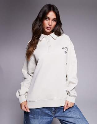 Shop The Couture Club Pilates & Pinot Button Up Polo Sweater In White
