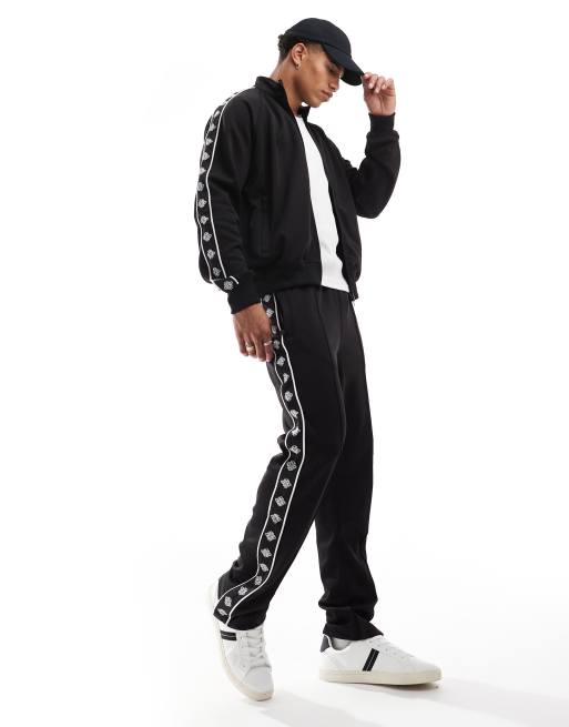 The Couture Club poly tricot trackies in black (part of a set)