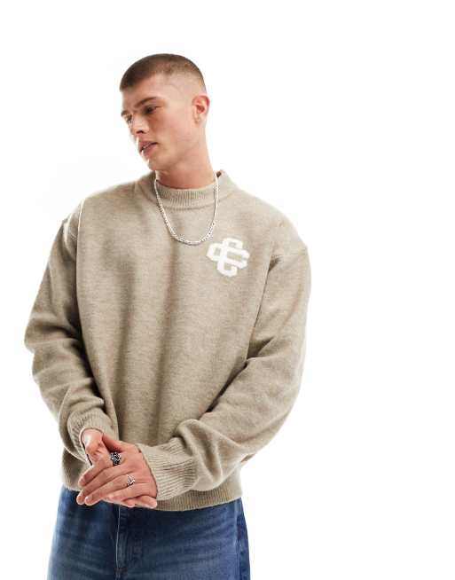 The Couture Club – Puszysty dzianinowy sweter z logo w melanżowym bezowym kolorze