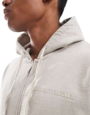 The Couture Club raw seam zip up hoodie in beige - part of a set