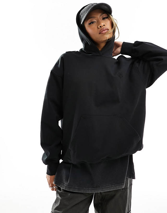 The Couture Club - relaxed emblem hoodie in black
