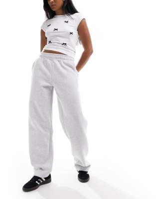 The Couture Club - Relaxed Fit Jogginghose in Grau meliert mit weitem Bein