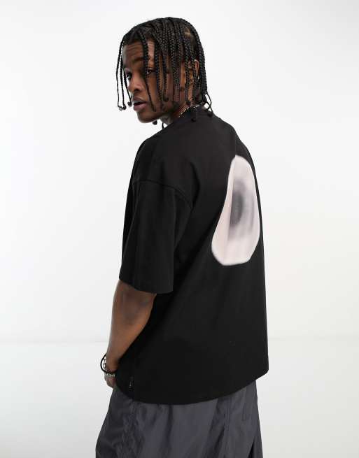 The Couture Club - Ruimvallend T-shirt in zwart met cirkelprint op de achterkant