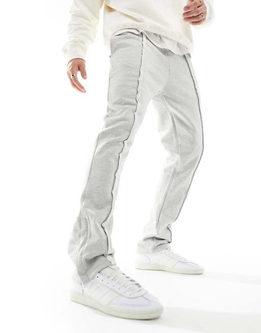 The Couture Club - Ruimvallende joggingbroek met onafgewerkte naden in gemêleerd grijs 