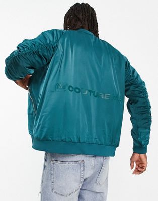 satin bomber jacket in teal blue with ruched sleeve detail