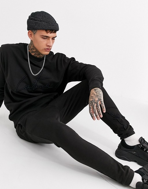 The Couture Club script logo tracksuit joggers