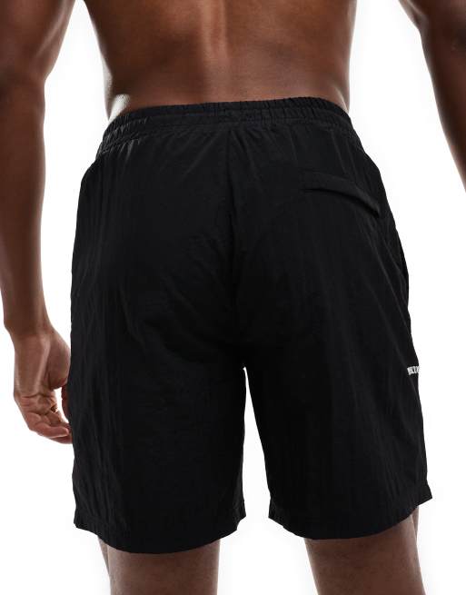 The Couture Club script print swim shorts in black, 4 of 4