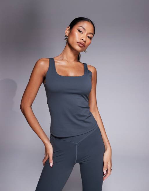 The Couture Club sculpting stretch scoop neck sports top in charcoal (part of a set)