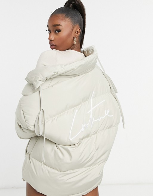 The Couture Club signature padded jacket in beige