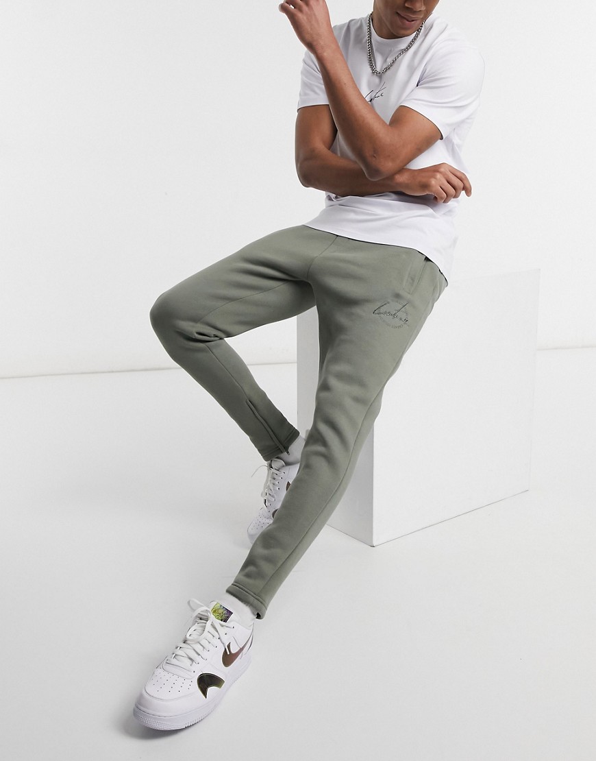The Couture Club slim fit archive update embroidered sweatpants in green