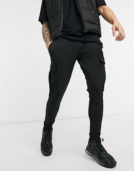 The Couture Club slim fit textured cargo joggers in black | ASOS