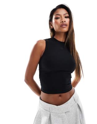 soft touch emblem high neck tank top in black