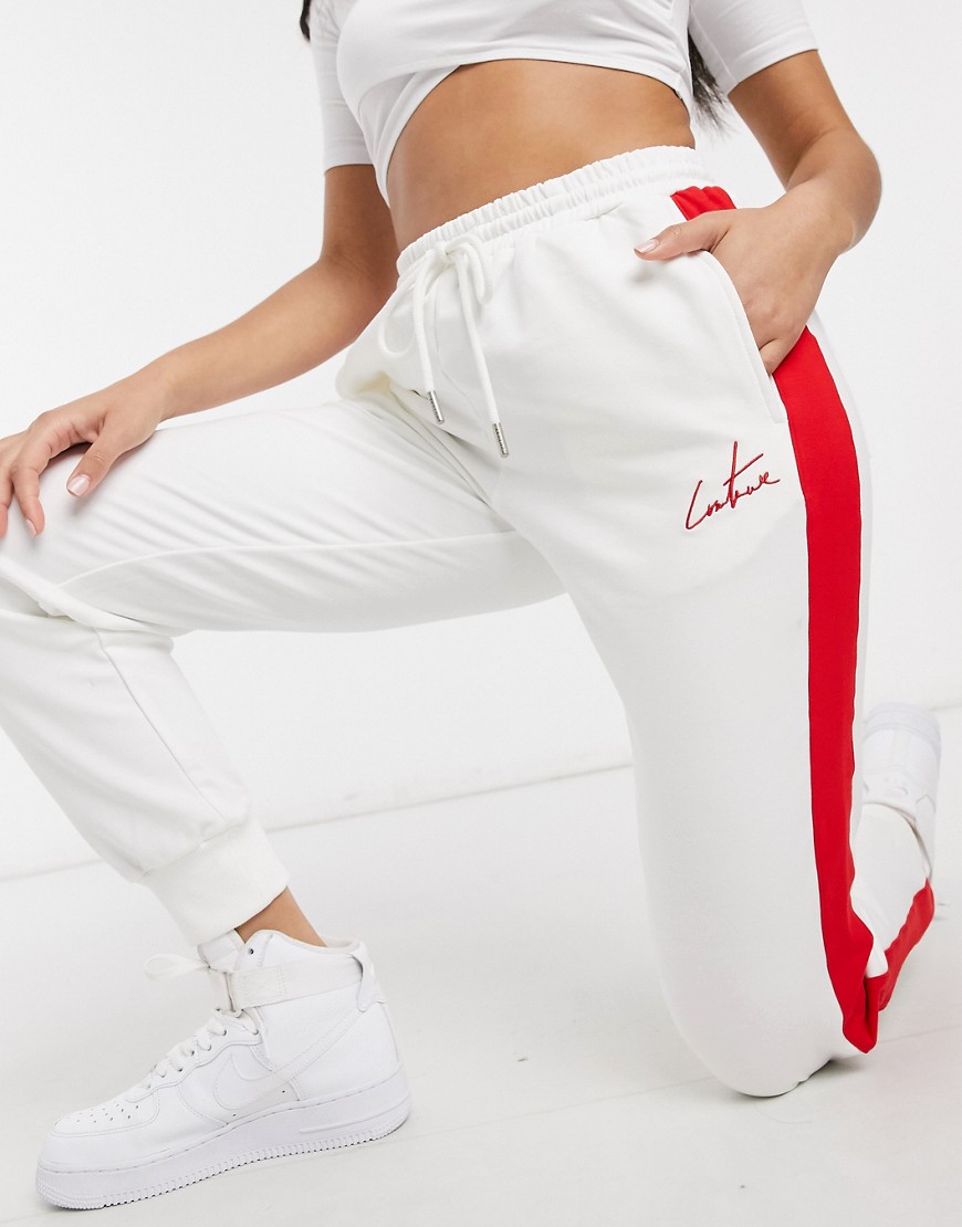 The Couture Club sporty stripe sweatpants in cream-White