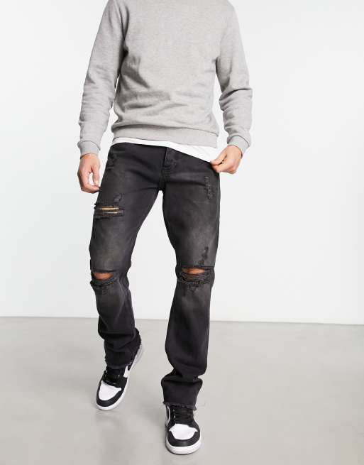 The Couture Club straight leg denim jeans in black with ripped knee detail