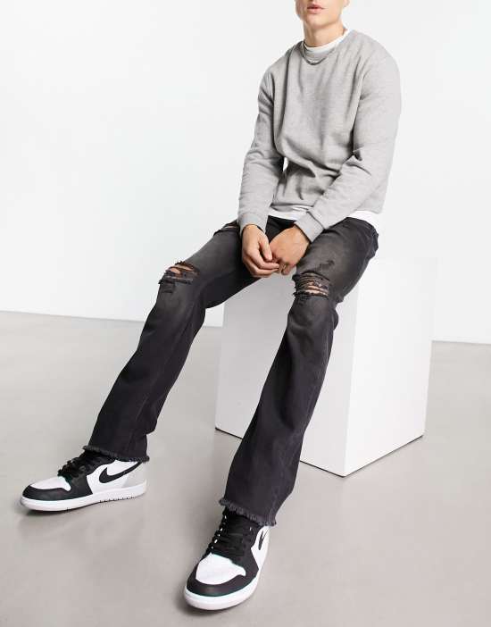 https://images.asos-media.com/products/the-couture-club-straight-leg-denim-jeans-in-black-with-ripped-knee-detail/203436516-3?$n_550w$&wid=550&fit=constrain
