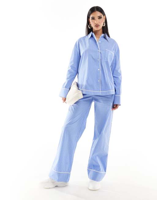 The Couture Club stripe pants with piping detail in blue - part of a set