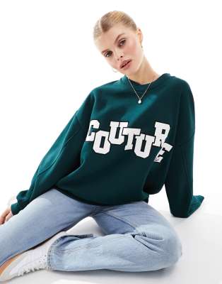 The Couture Club - Sweatshirt in Dunkelgrün mit Applikation