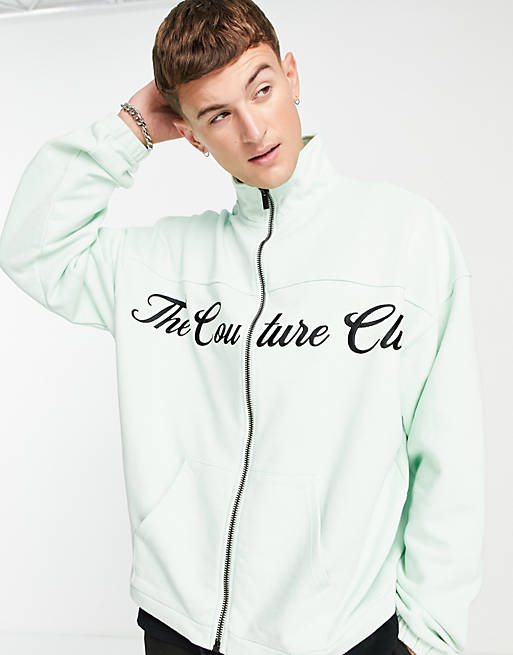 The Couture Club track jacket in mint green with logo print