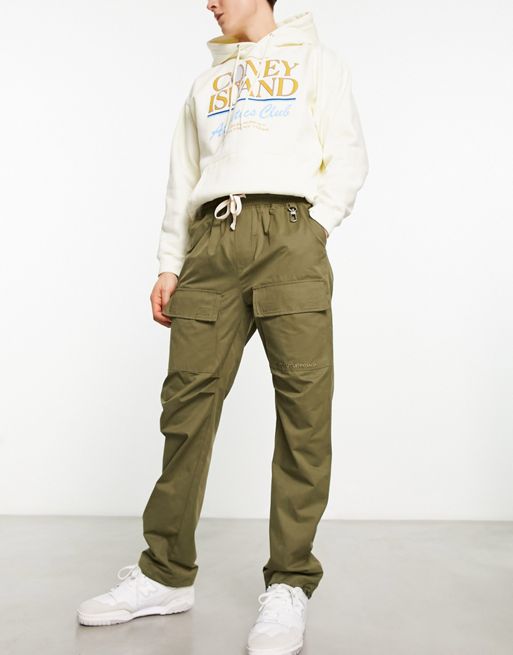 The Couture Club utility cargo trousers in khaki green | ASOS