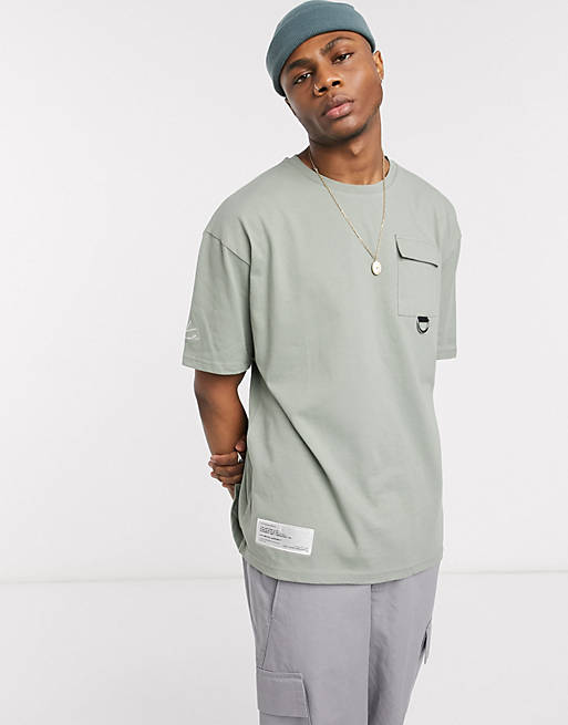 The Couture Club utility D ring box t-shirt in light green | ASOS