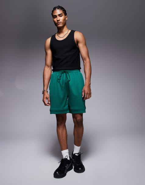 The Couture Club varsity mesh shorts in forest green - view 1