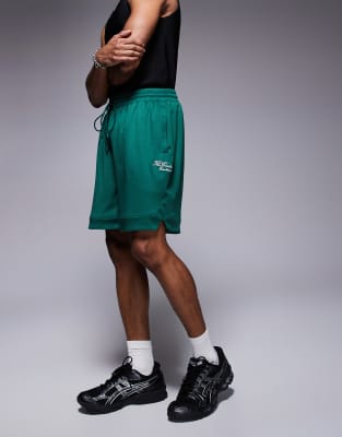 The Couture Club varsity mesh shorts in forest green | ASOS
