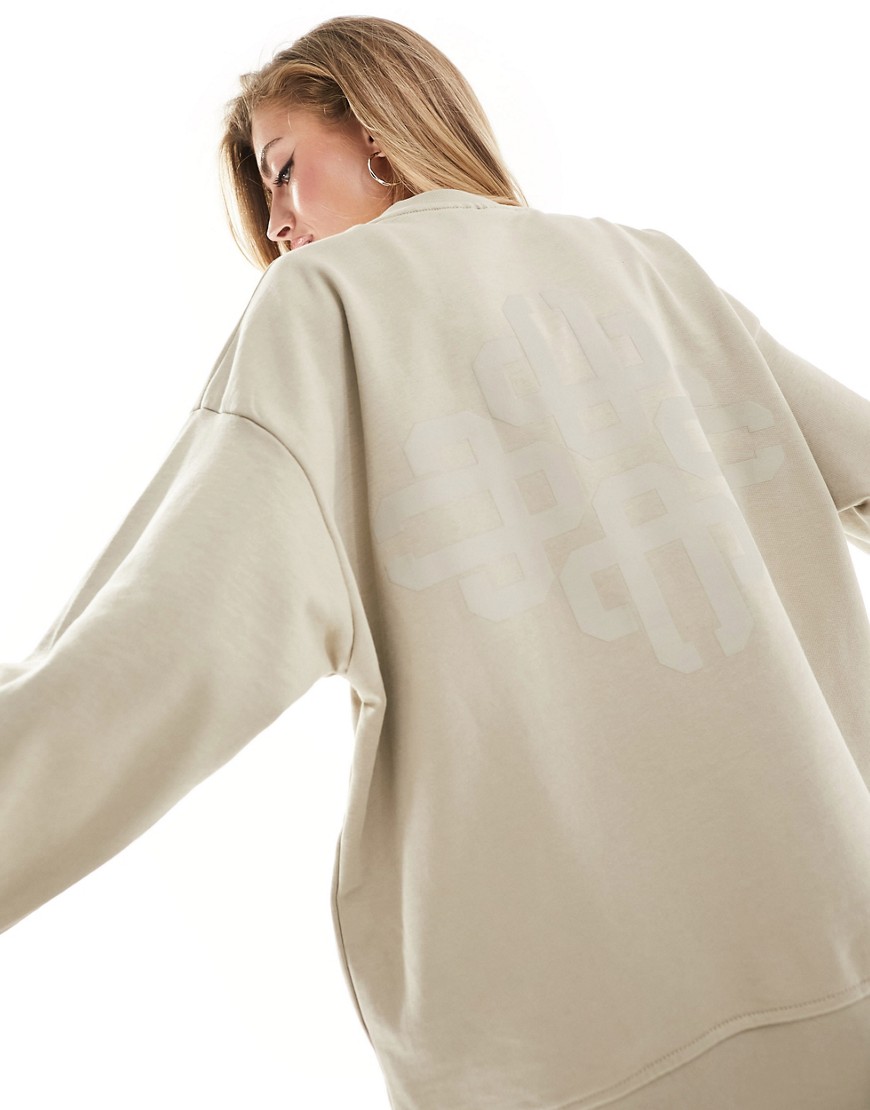 The Couture Club washed emblem sweatshirt in beige-Neutral