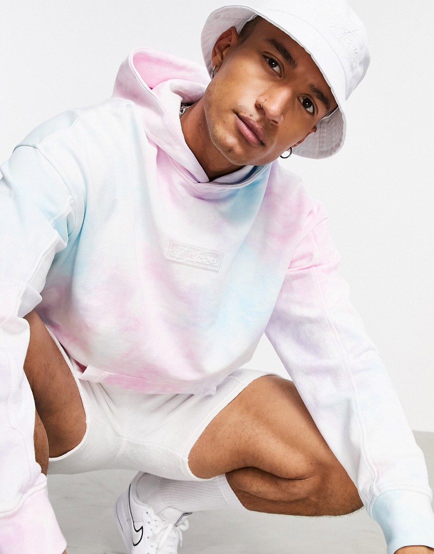 The Couture Club x Ellesse tie-dye logo hoodie in pink
